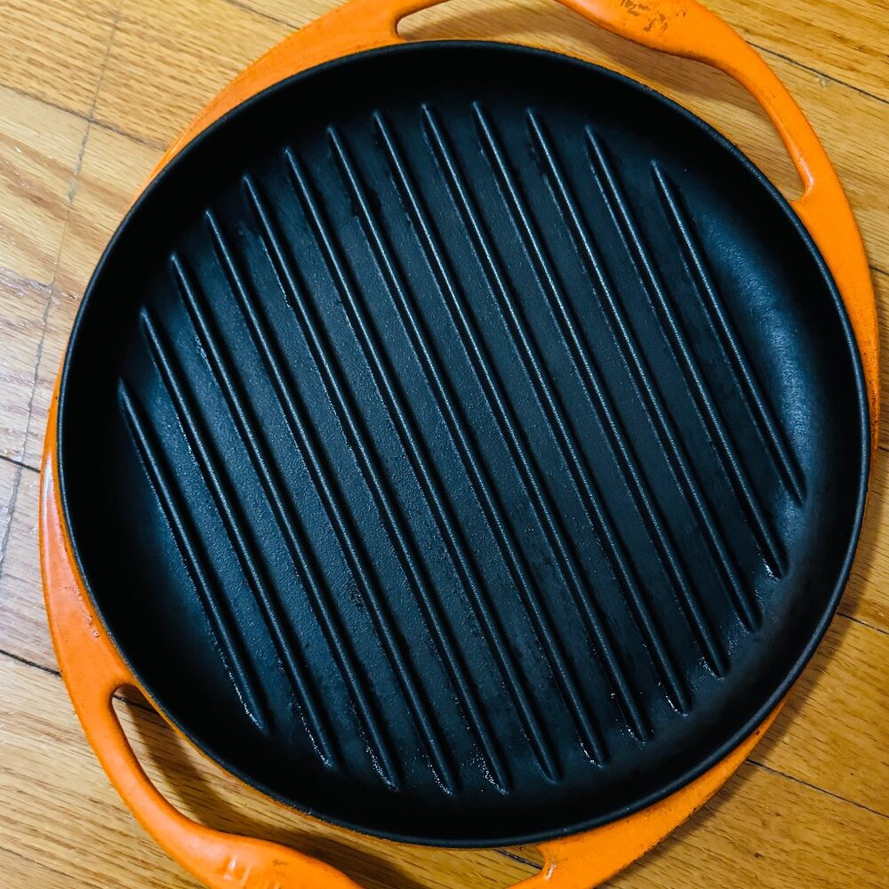 Le Creuset round cast iron grill pan with handles, orange, 10in, #26, France